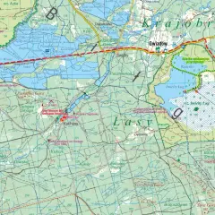 Mapa turystyczna przedstawiająca **lasy janowskie** z zaznaczonymi szlakami, rezerwatami i miejscami pamięci.